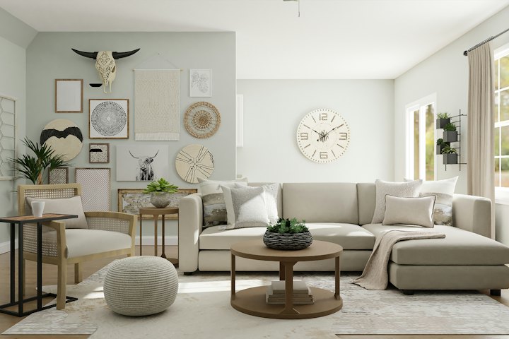 A living room in warm neutral tones with plants